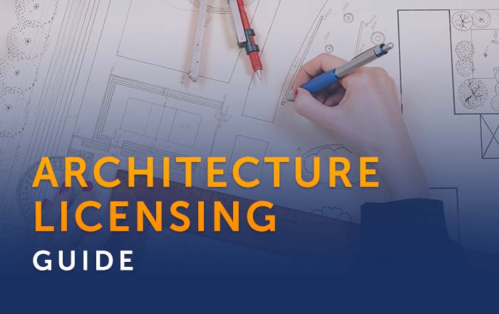 An overhead view of an architect sketching a blueprint